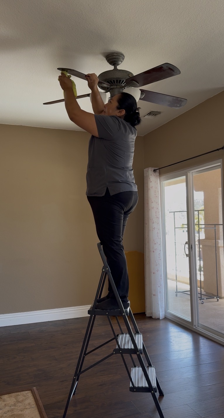 Ceiling fan and light cleaning during a move-out cleaning service in Carlsbad by Cali Wave Cleaning